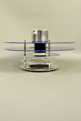 une photo d'une table basse en verre argenté et bleu