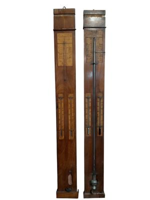 pair of antique wooden wall mounted thermometers with brass accents