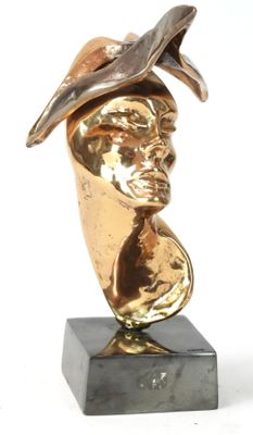 statue of a woman wearing a hat on a marble base