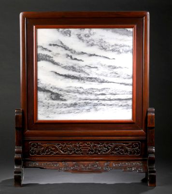 an image of a picture frame with a marble in it