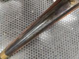 a close up of a baseball bat that is on a table