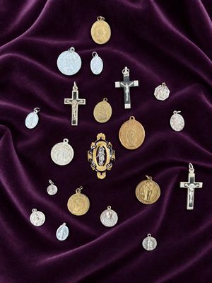 purple velvet with a bunch of silver and gold charms on it