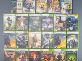 beaucoup de jaquettes de jeux vidéo accrochées au mur