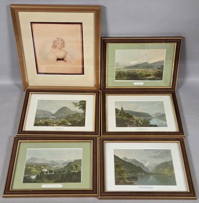 four framed pictures of mountains and a lake in a wooden frame