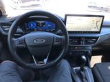 a picture of a driver ' s view of the interior of a car