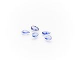 a group of three blue sapphires on a white background