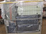 a large metal cart with a lot of items in it