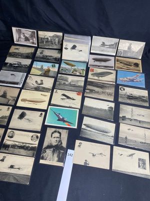 some old photos of airplanes and planes are on a table