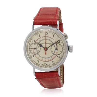 an image of a wrist watch with a red leather strap