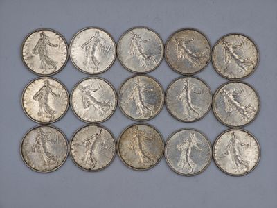 a close up of a bunch of coins on a table