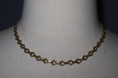 a close up of a necklace on a mannequin mannequin mannequin mannequin mannequin mannequin mannequin mannequin