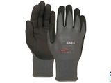 une image représentant une paire de gants noirs sur fond blanc