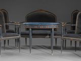 une image représentant un ensemble composé de quatre chaises et d'une table au plateau en marbre