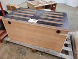 a wooden box that is sitting on top of a pallet
