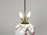 an image of a table lamp with a bird on it