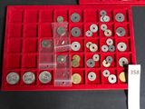 a red box with a lot of coins in it