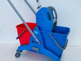 a blue cart with a red bucket and a blue mop