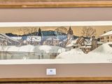 framed picture of a painting of a village in the snow