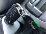 a car key that is attached to a car key holder