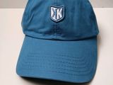the hat is blue and has a k emblem on it