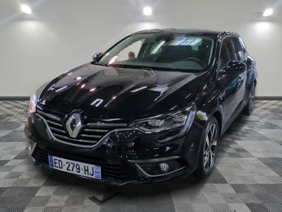 the black car is parked on the checkered floor in the garage