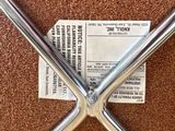 an image of a close up of a baseball bat on a carpet