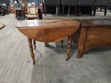 a table that is sitting on the floor in a room