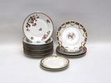several plates are stacked on top of each other on a white surface