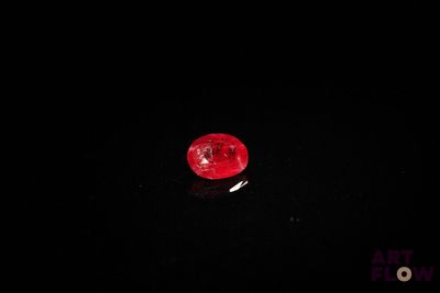 an image of a red object in the dark