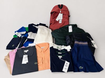 a pile of men ' s clothing on a white surface