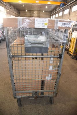 a metal cage with a printer in it in a warehouse