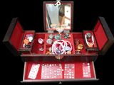 a wooden box with a mirror and jewelry inside of it