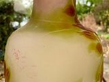 a glass vase that is sitting on a table