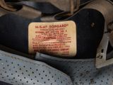a close up of a shoe with a tag on it