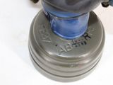 a blue fire hydrant sitting on top of a white table