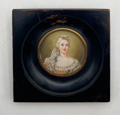 painting of a woman with a veil in a black frame