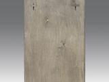 a close up of a metal object on a gray background