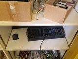 two pictures of a desk with a keyboard and a mouse