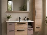 une salle de bains équipée d'un lavabo, d'un miroir, de placards et d'une plante en pot