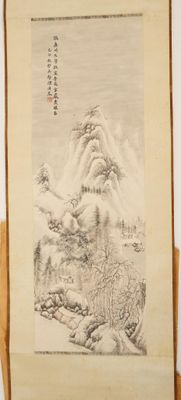 an old book with a picture of a mountain in the background
