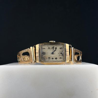 Montre de dame, boitier en or jaune 750/1000 (18K) et argent…