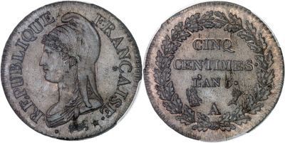 a close up of a coin with a woman on it