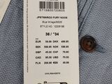 a close up of a label on the back of a shirt