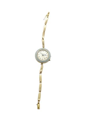 une image représentant une montre-bracelet pour femme montée sur un bracelet en or