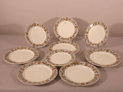 six plates with floral designs are arranged on a table