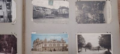 un livre dont les pages contiennent des photos de bâtiments anciens