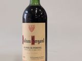 a bottle of wine that is sitting on a table