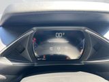 the dashboard of a car with a digital display on it