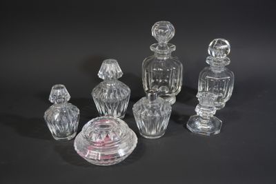 a lot of glass objects that are on a table