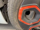 a close up of a tire on a vehicle